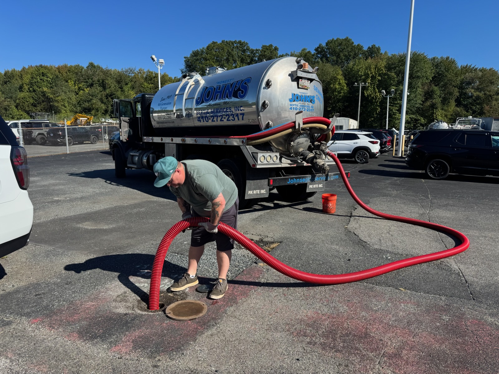 John's Septic Service pump truck on the job in Harford County, MD